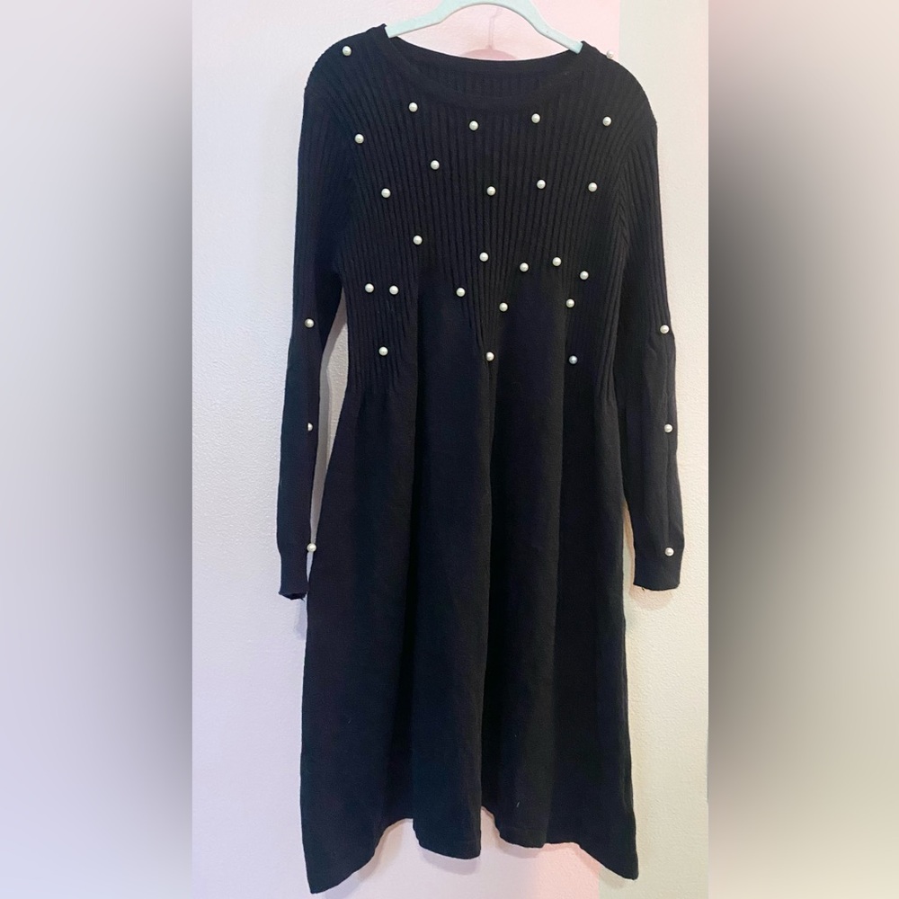 Long sleeved knit dress with accent beads